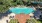 a pool surrounded by trees