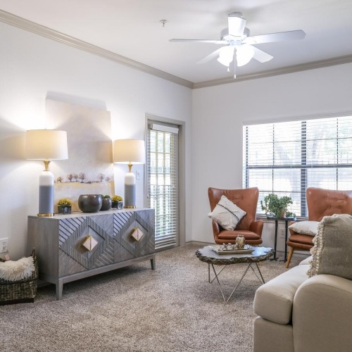 Gorgeous natural light in your living space a living room with a bed and a couch