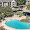 pool with spacious areas and lush landscaping