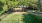 a person walking on a path in a park
