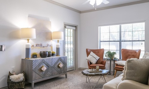 a living room with a bed and a couch