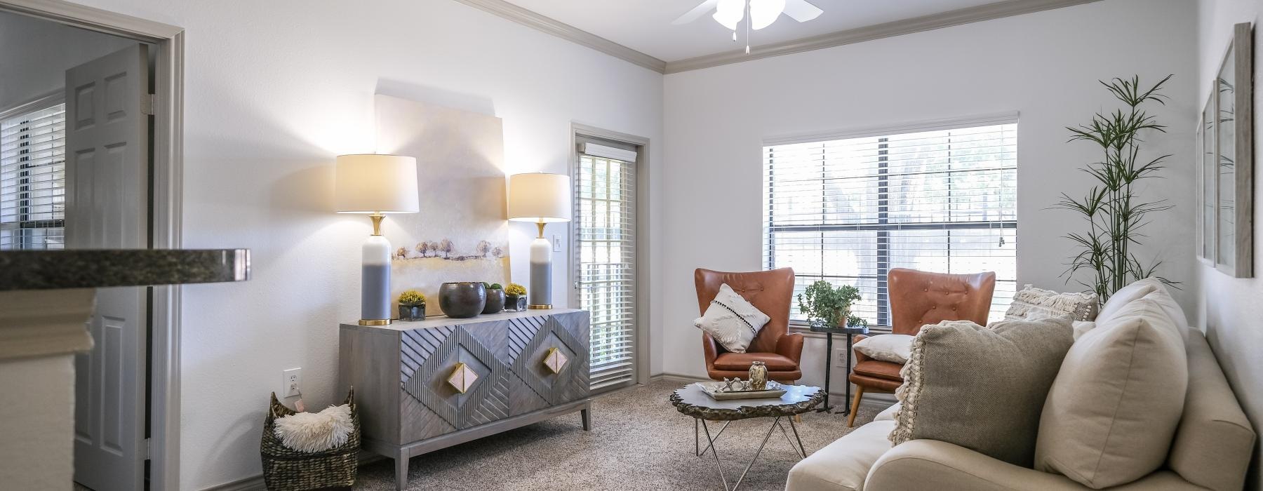 a living room with a bed and a couch