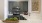 a kitchen with black cabinets